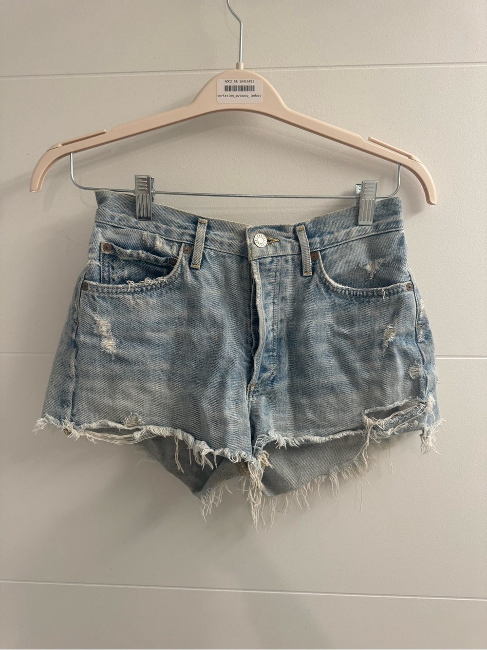 Agolde Light Blue Distressed Denim Cutoff Shorts